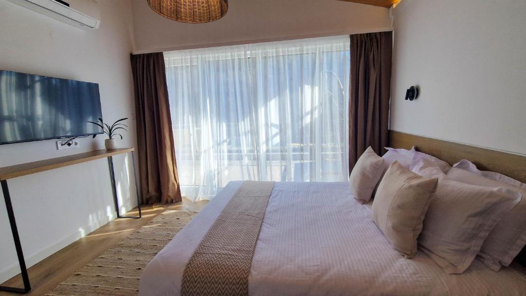 Postel nebo postele na pokoji v ubytování Waterside SPA Hotel