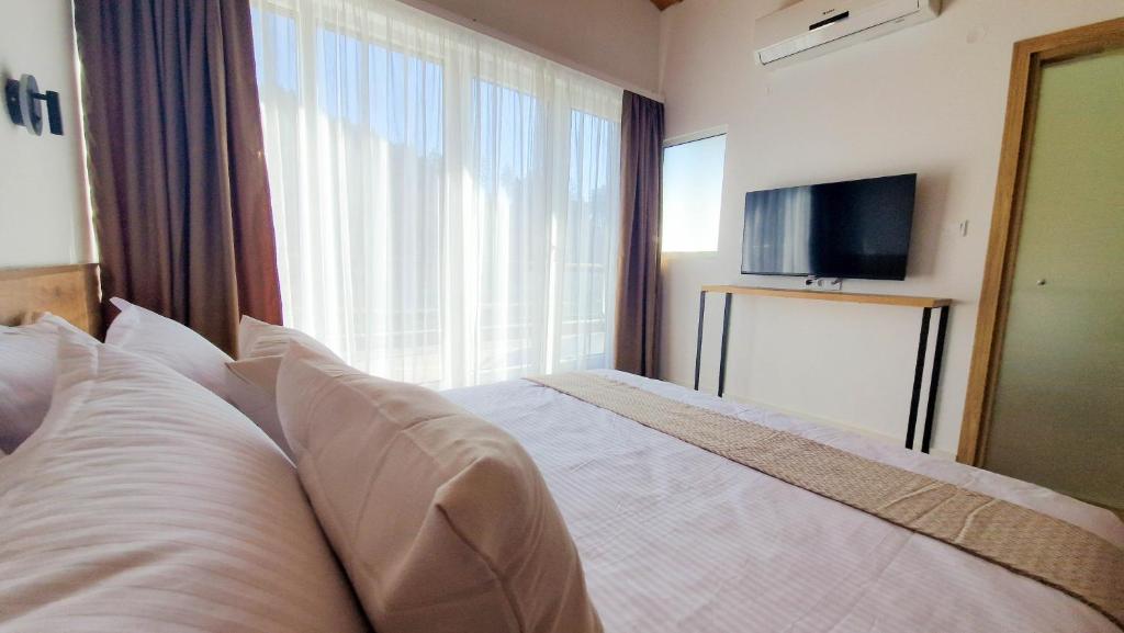 TV a/nebo společenská místnost v ubytování Waterside SPA Hotel