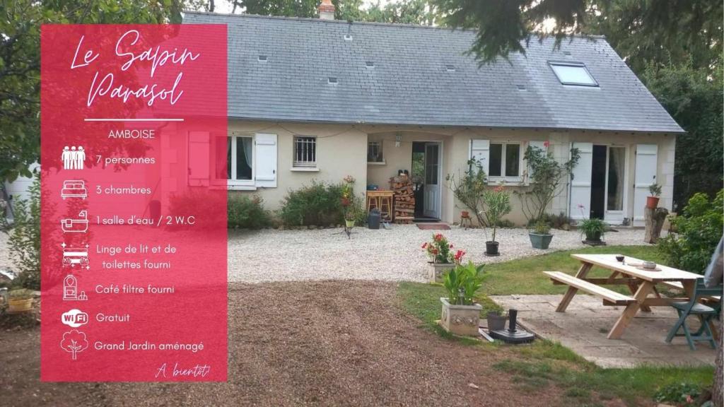 uma casa com um sinal em frente em Le Sapin Parasol - Maison pour 7 pers. em Lussault-sur-Loire