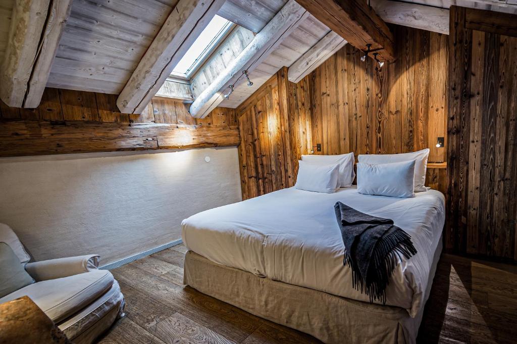 Postel nebo postele na pokoji v ubytování Zannier Le Chalet