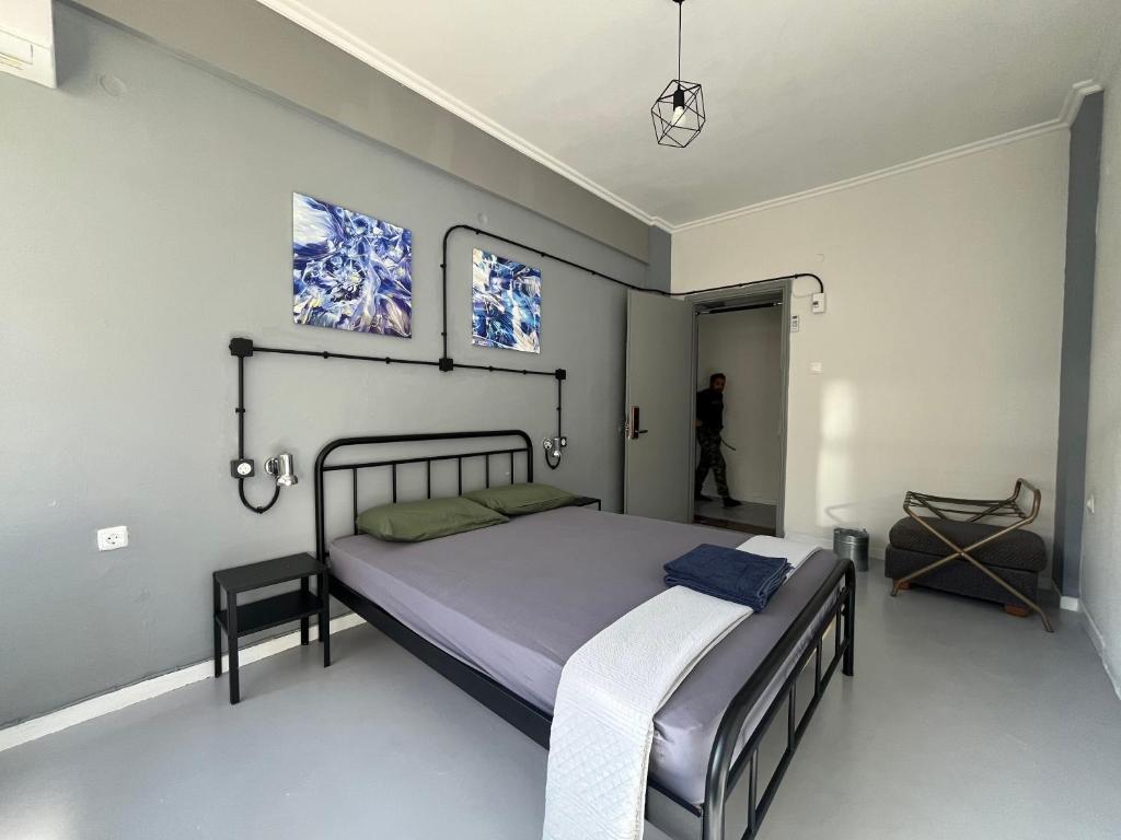 Кровать или кровати в номере Urban Rooms