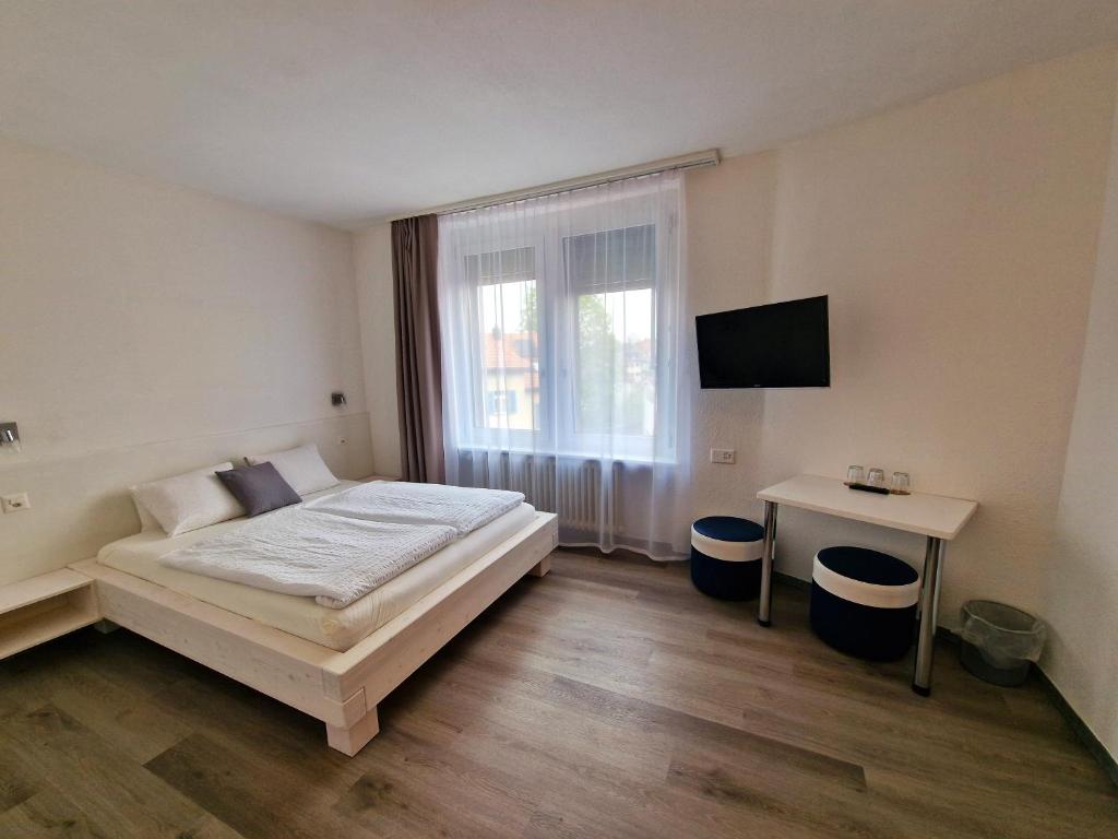 Postel nebo postele na pokoji v ubytování Plaza