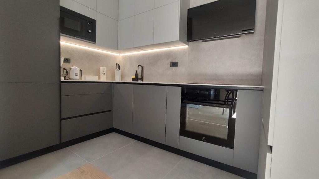 Kuchyňa alebo kuchynka v ubytovaní Apartman Spalatum