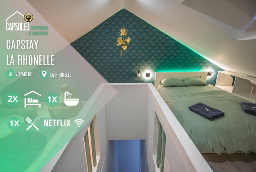 Cette chambre comprend un lit et un mur vert. dans l'établissement Capstay la Rhonelle - Netflix - 2 chambres - Cuisine, à Valenciennes