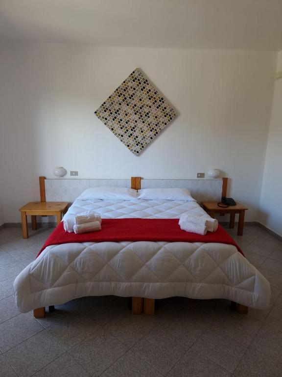 Postel nebo postele na pokoji v ubytování Hotel Mistral