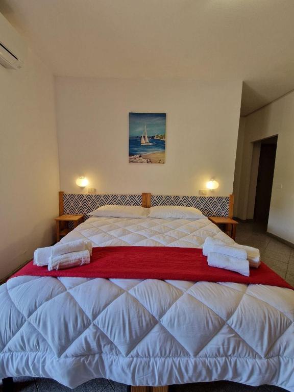 Postel nebo postele na pokoji v ubytování Hotel Mistral