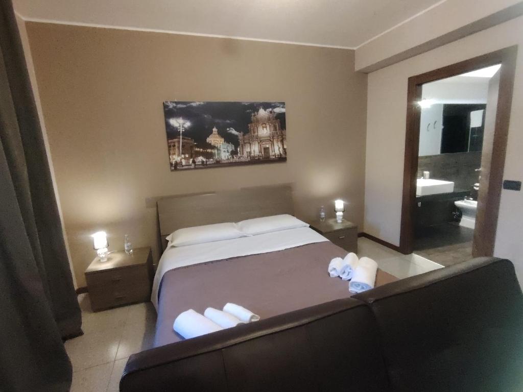 Łóżko lub łóżka w pokoju w obiekcie Calipso Bed&Breakfast