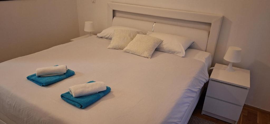 Postel nebo postele na pokoji v ubytování Apartman Lane