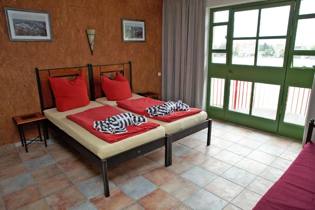 Seminar- und Gästehaus Flussbad Gartenstrasse - Zweibettzimmer