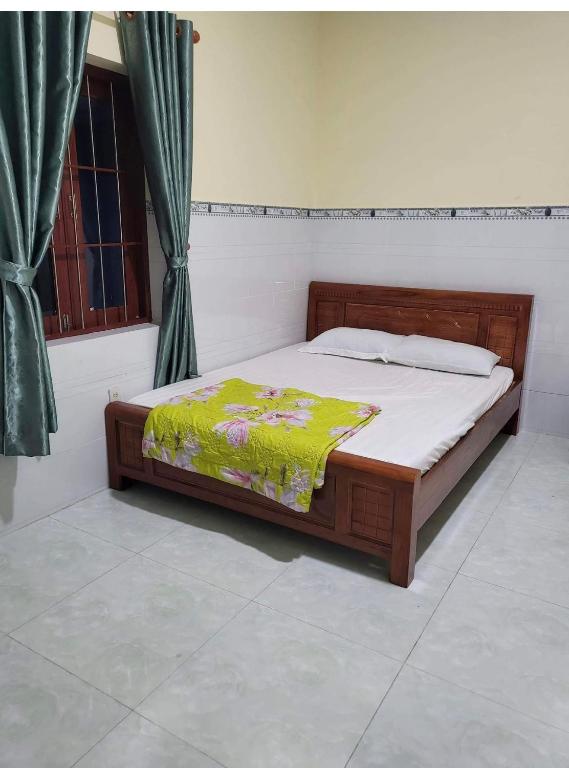 Postel nebo postele na pokoji v ubytování San Vuon Guesthouse