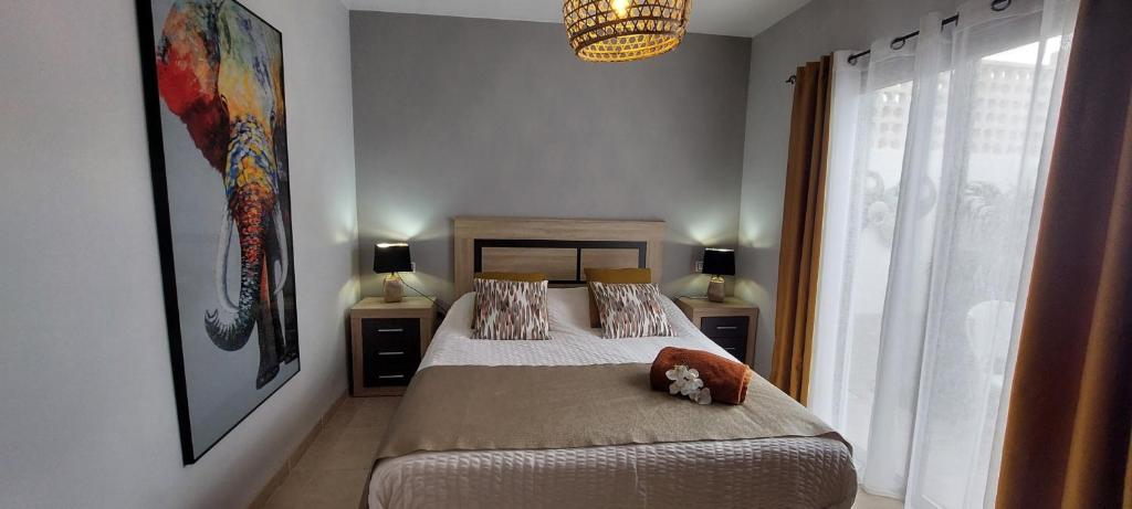 A bed or beds in a room at Villa Del Corazon Salinas Golf