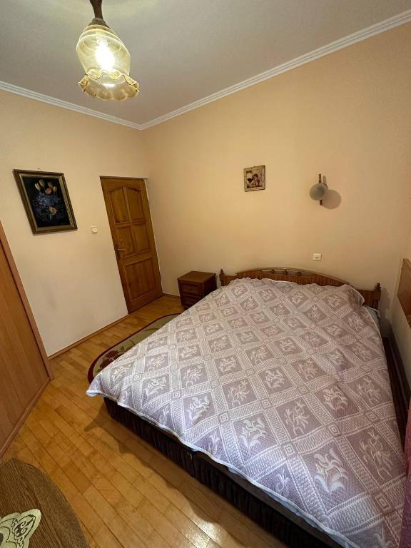 Postel nebo postele na pokoji v ubytování Роксолана