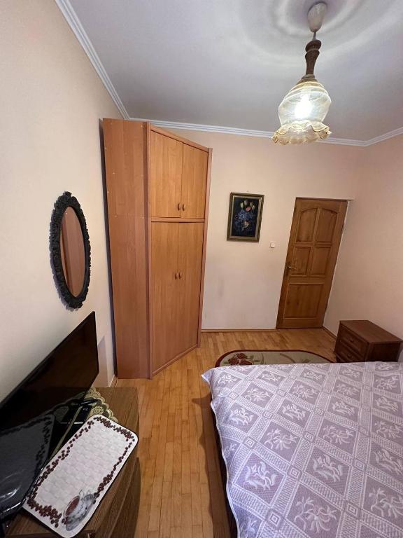 Postel nebo postele na pokoji v ubytování Роксолана