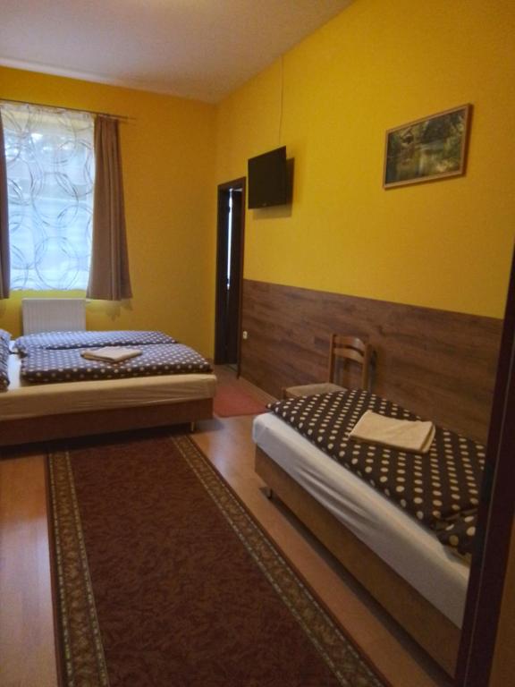 Posteľ alebo postele v izbe v ubytovaní Örségkapuja Vendégház