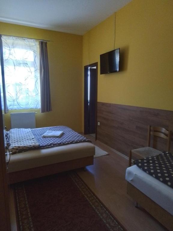 Posteľ alebo postele v izbe v ubytovaní Örségkapuja Vendégház