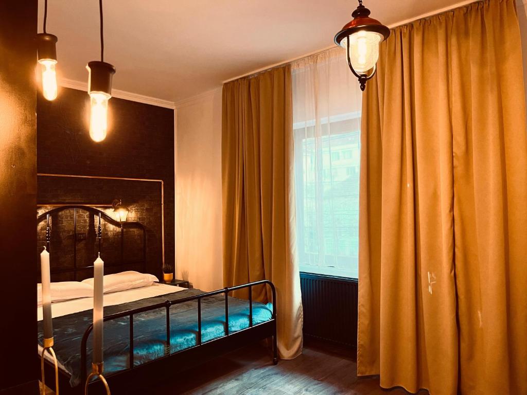 Postel nebo postele na pokoji v ubytování Cozy Hideout - Condo Hotel