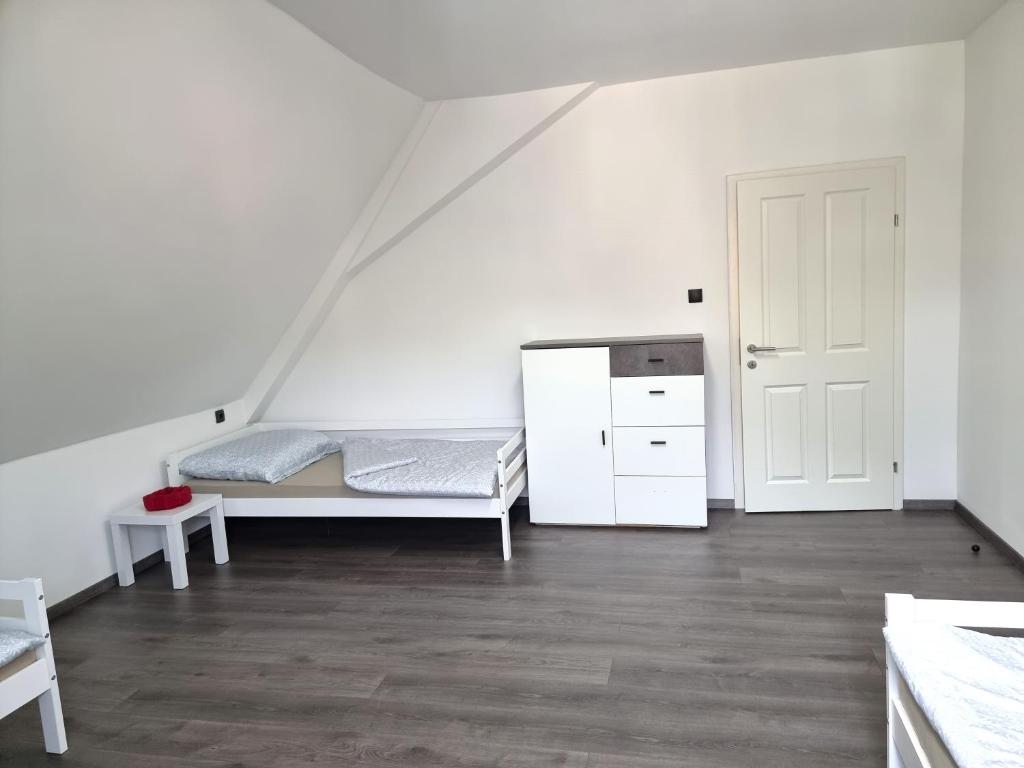 Postel nebo postele na pokoji v ubytování Rentcenter79
