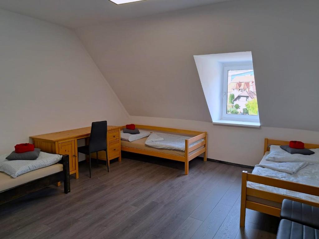 Postel nebo postele na pokoji v ubytování Rentcenter79