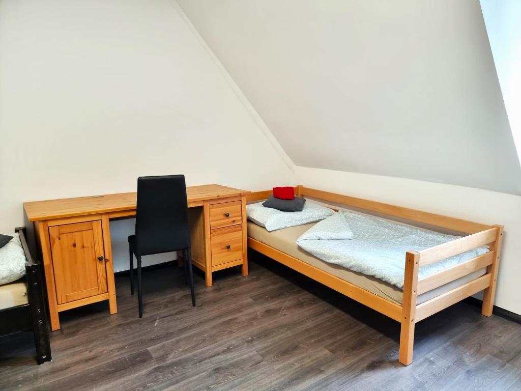 Postel nebo postele na pokoji v ubytování Rentcenter79