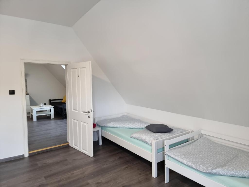 Postel nebo postele na pokoji v ubytování Rentcenter79
