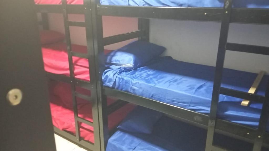 a couple of bunk beds in a room at SP HOSTEL in Sao Paulo