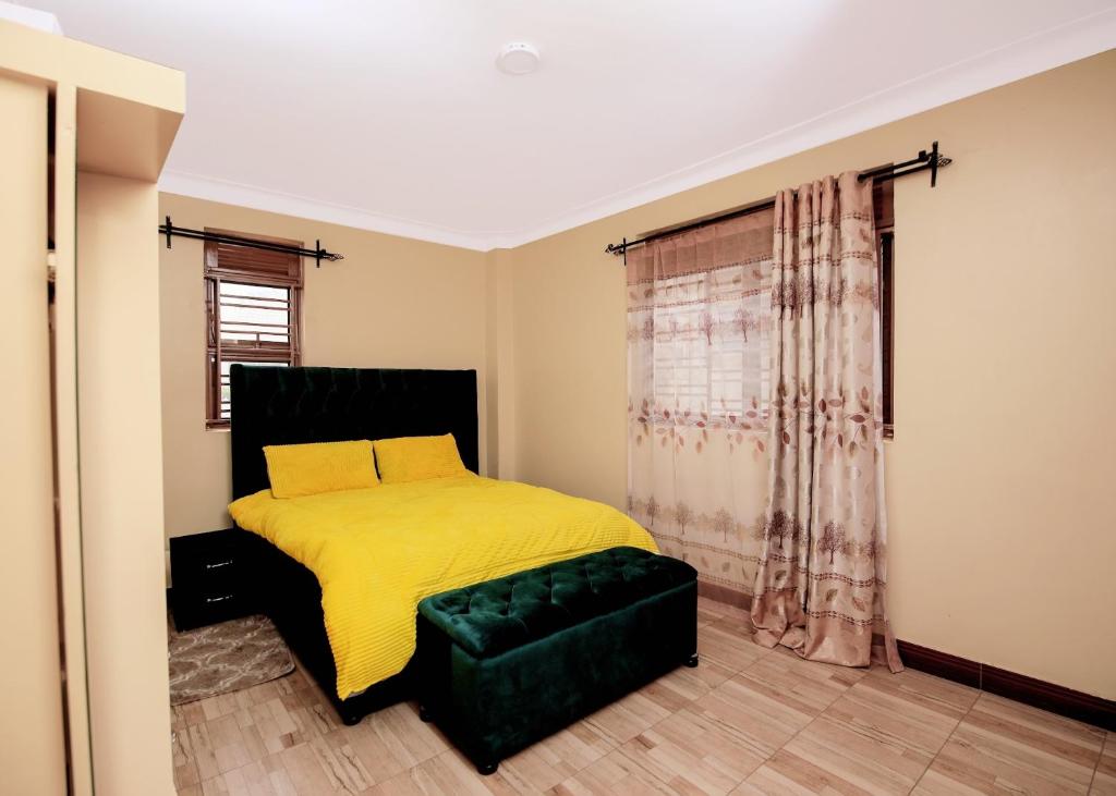 Ένα ή περισσότερα κρεβάτια σε δωμάτιο στο Urban Elegance