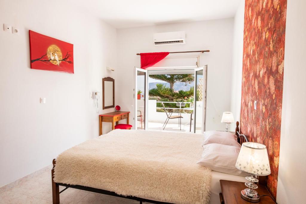 Postel nebo postele na pokoji v ubytování Perama Hotel, Karpathos