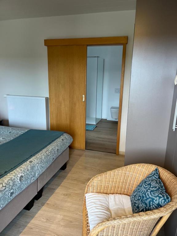 Postel nebo postele na pokoji v ubytování B&B au 27