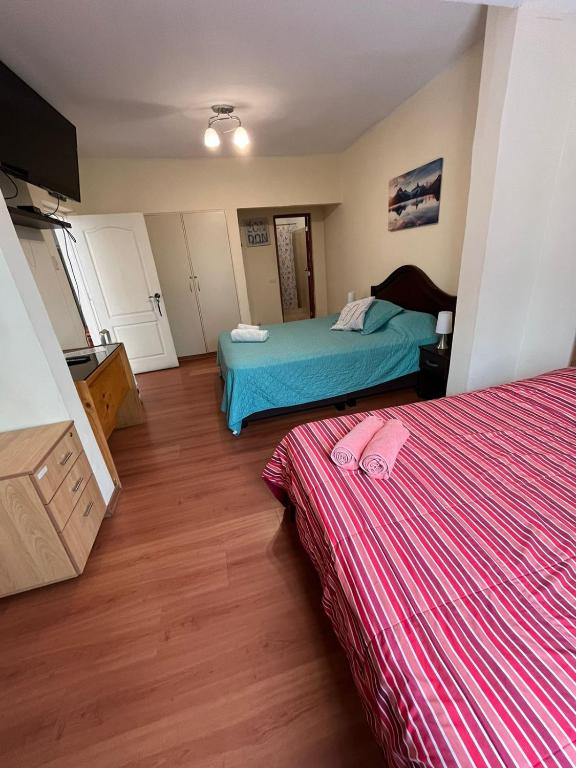 Postel nebo postele na pokoji v ubytování Uli´s house