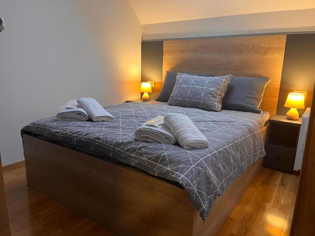 Postelja oz. postelje v sobi nastanitve Lux Apartman Aleksandar