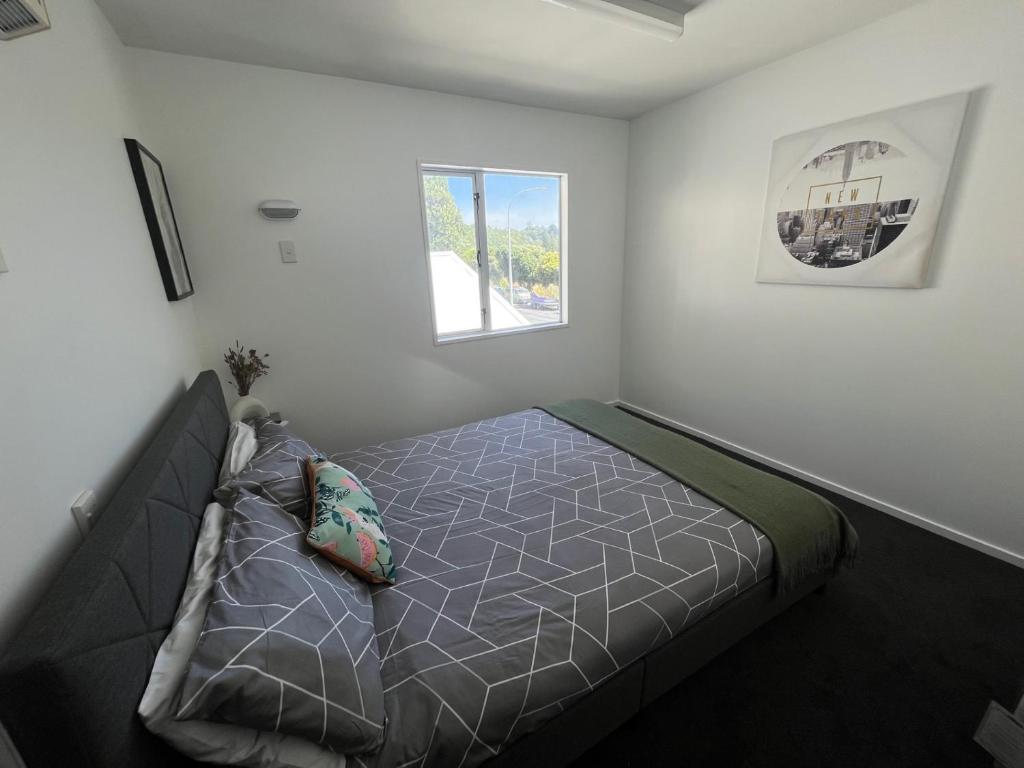 Postel nebo postele na pokoji v ubytování Kaikoura Seaside lodge