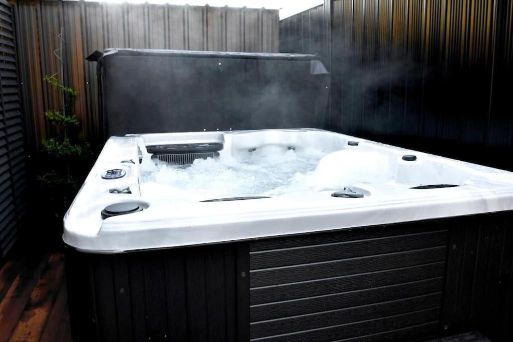 a bath tub filled with snow in a bathroom at Twin Rivers Spa Retreat in Queenstown