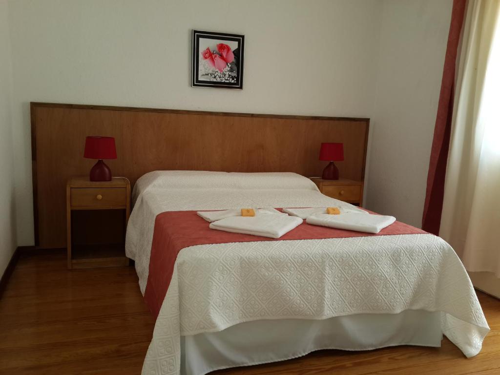 Postel nebo postele na pokoji v ubytování Hotel Select