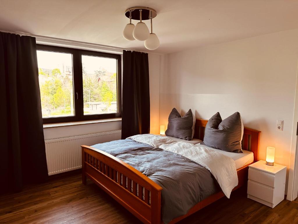 SPEYERBACH - modernes Apartment nahe Neustadter Innenstadt tesisinde bir odada yatak veya yataklar