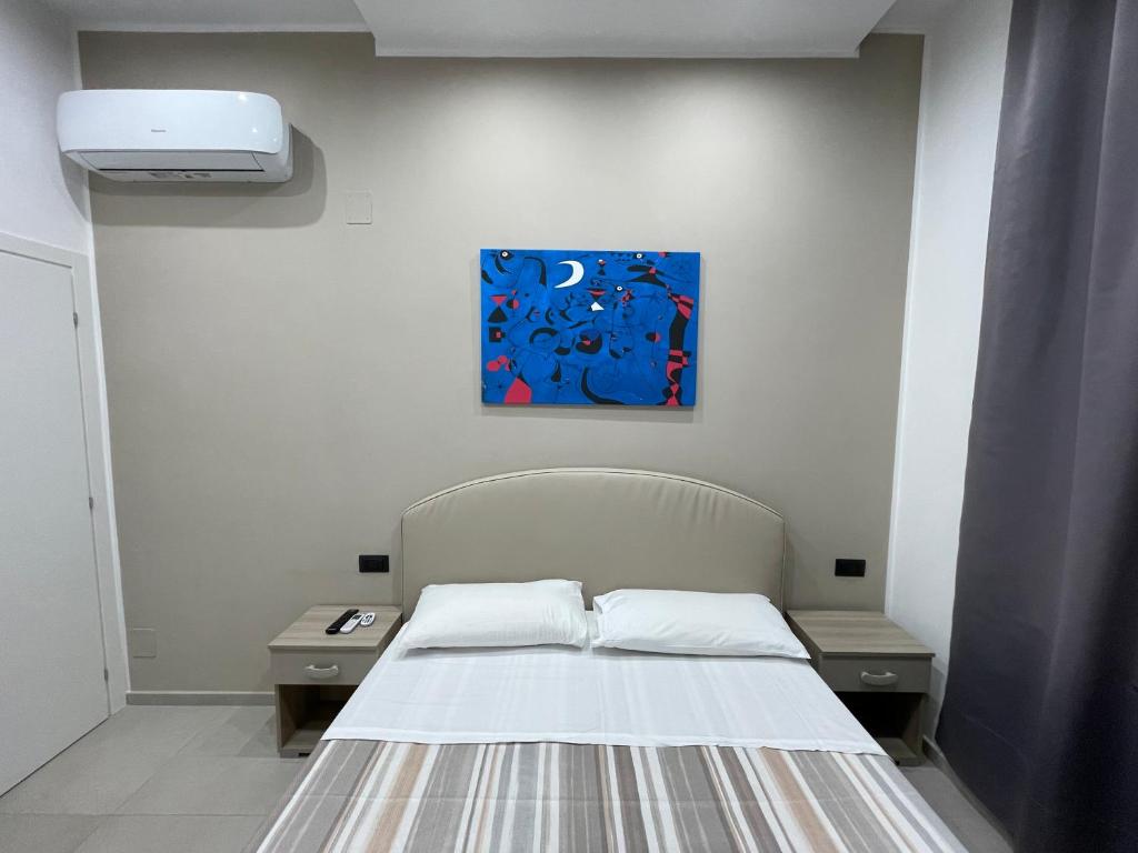 Posteľ alebo postele v izbe v ubytovaní Room25mq