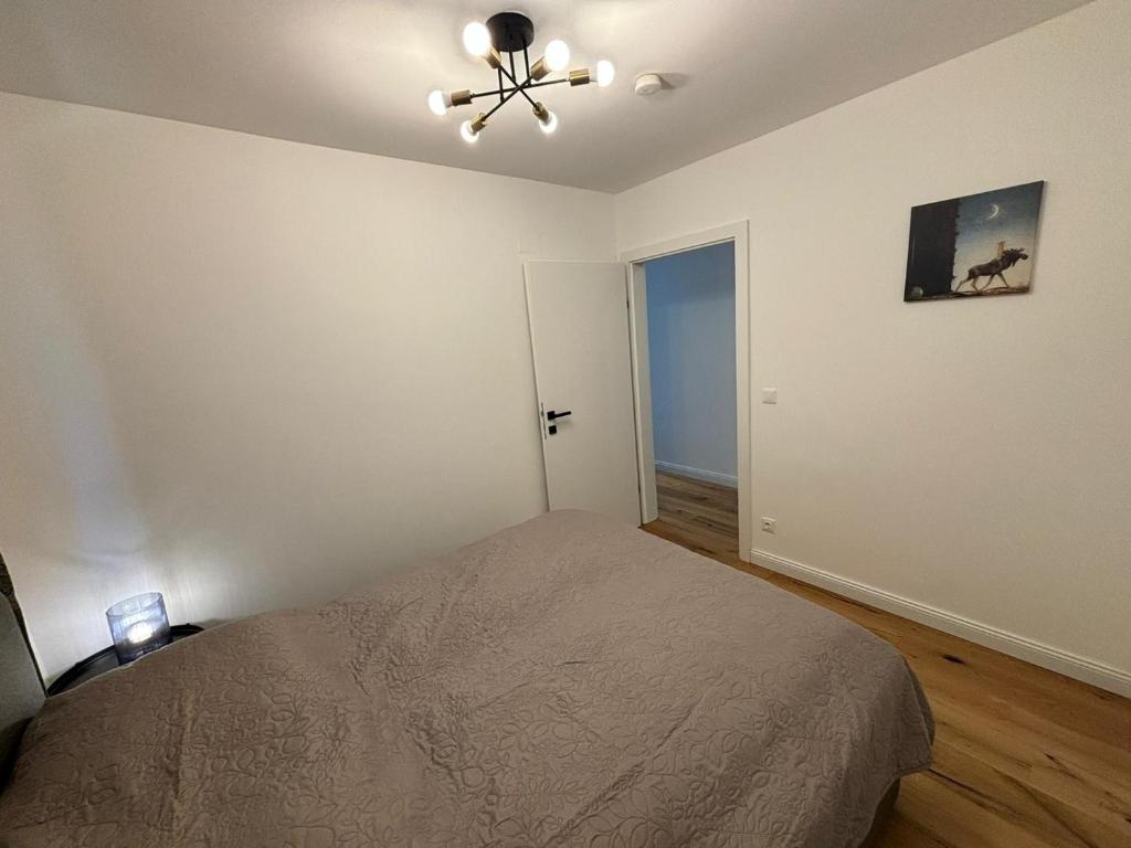 Postel nebo postele na pokoji v ubytování Aparthotel Infinity