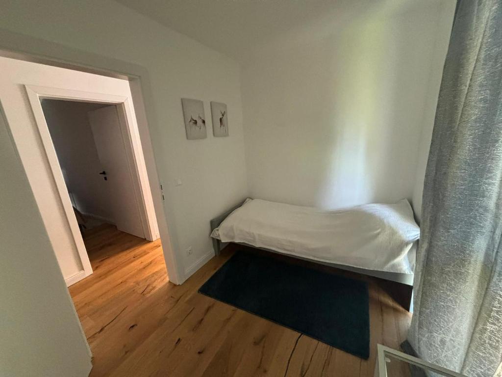 Postel nebo postele na pokoji v ubytování Aparthotel Infinity
