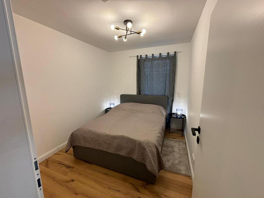 Postel nebo postele na pokoji v ubytování Aparthotel Infinity