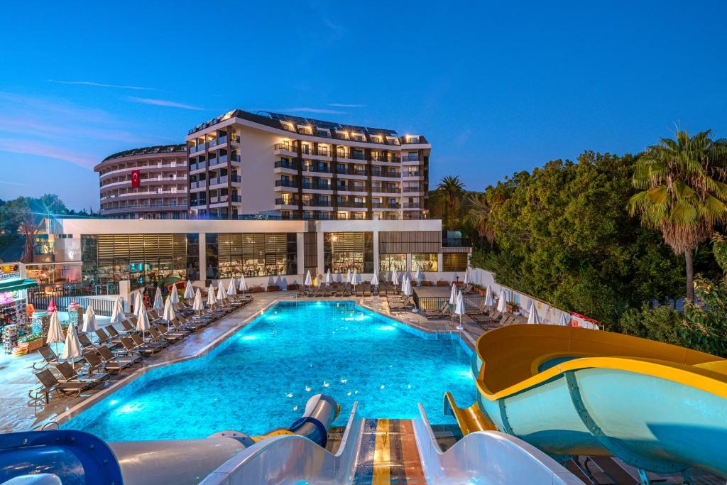a hotel with a swimming pool and a resort at SEAPHORIA BEACH HOTEL & Spa - by Mir'Amor-Ultra All Inclusive in Antalya