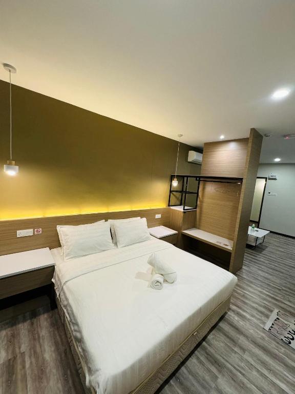 Postel nebo postele na pokoji v ubytování STAR HOTEL