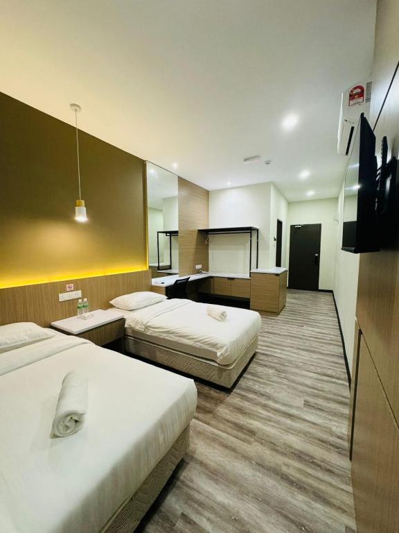 Postel nebo postele na pokoji v ubytování STAR HOTEL