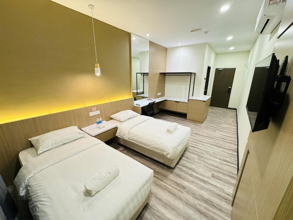 Postel nebo postele na pokoji v ubytování STAR HOTEL