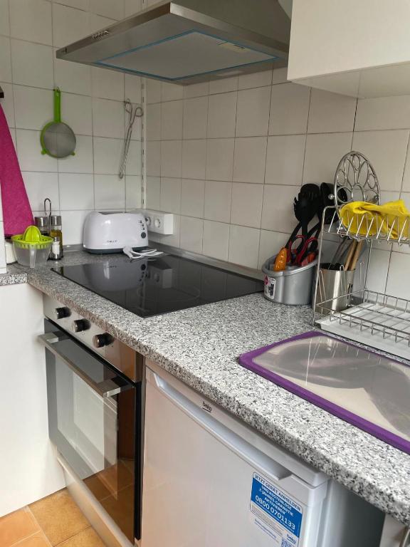 Kuchyň nebo kuchyňský kout v ubytování Casa da Fontiña