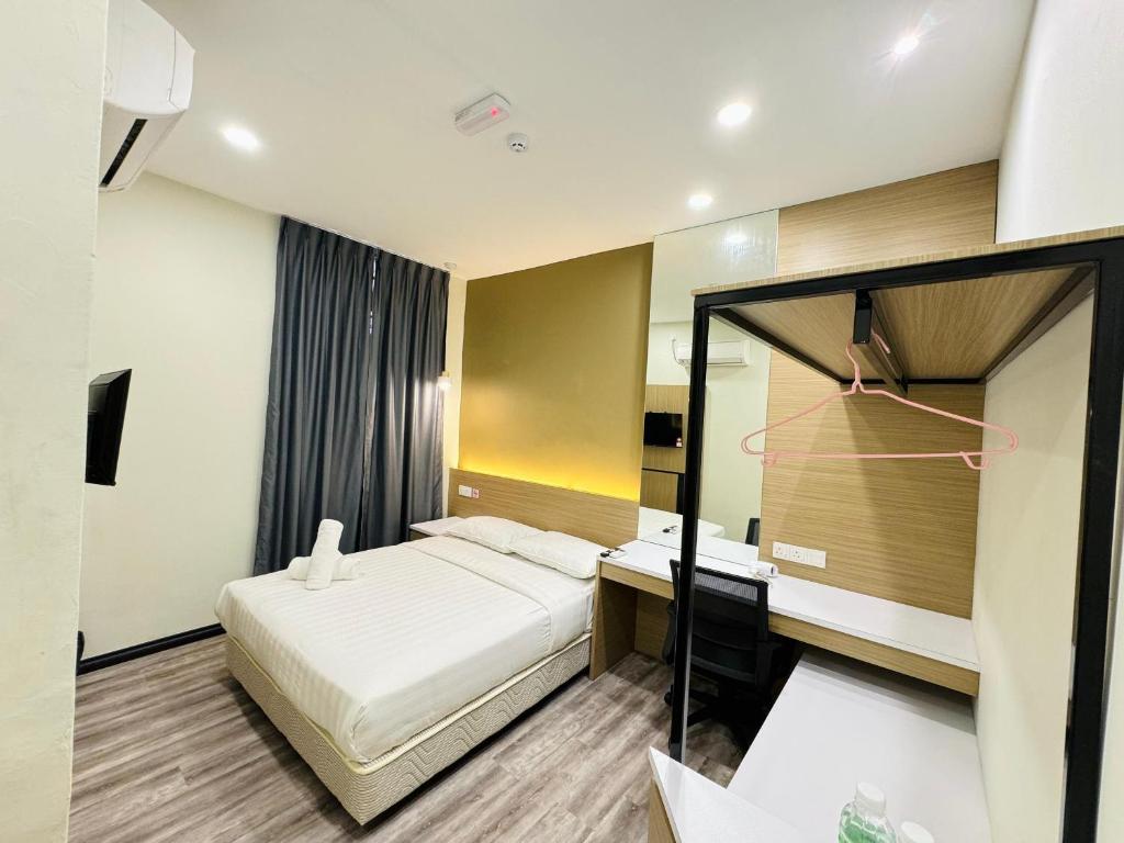Postel nebo postele na pokoji v ubytování STAR HOTEL