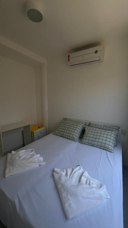 Postel nebo postele na pokoji v ubytování VIRASSOL Praia Hotel