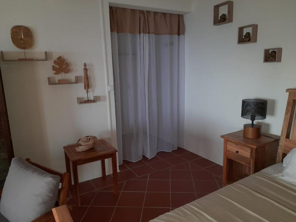 Postel nebo postele na pokoji v ubytování Tropic Bellevue