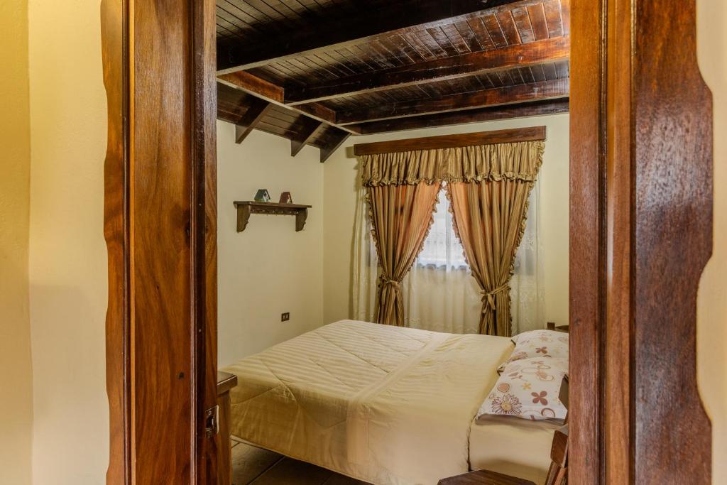 Postel nebo postele na pokoji v ubytování Casa en la colonia Tovar