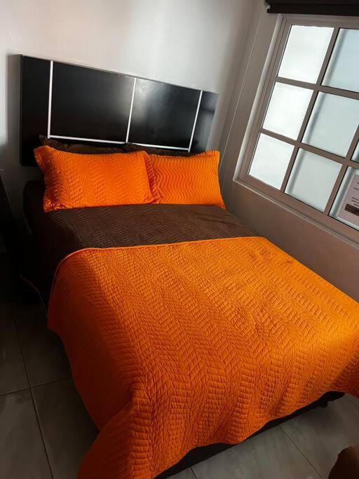 Postel nebo postele na pokoji v ubytování Casa La Tabasqueña