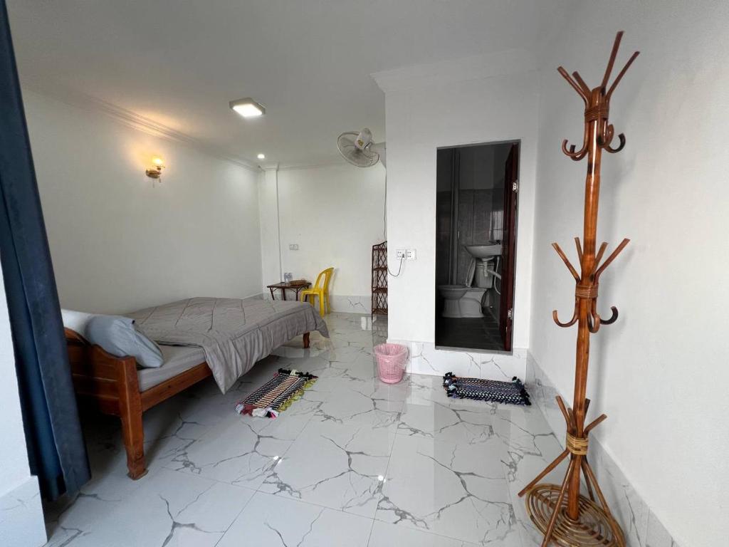 Postel nebo postele na pokoji v ubytování El Ling guesthouse