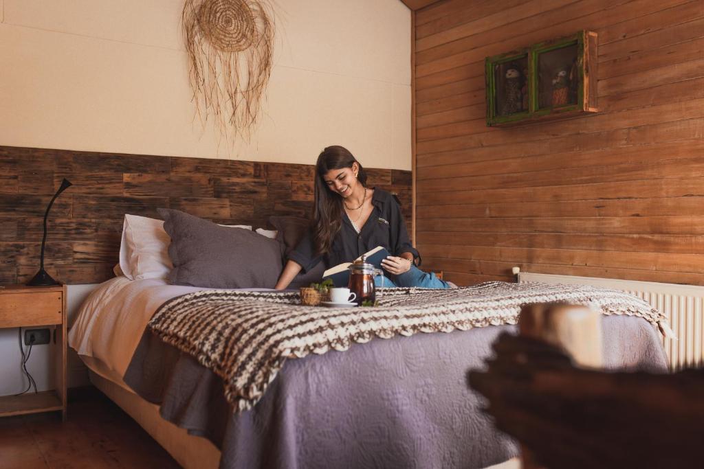 Postel nebo postele na pokoji v ubytování Palafito Hostel Chiloé